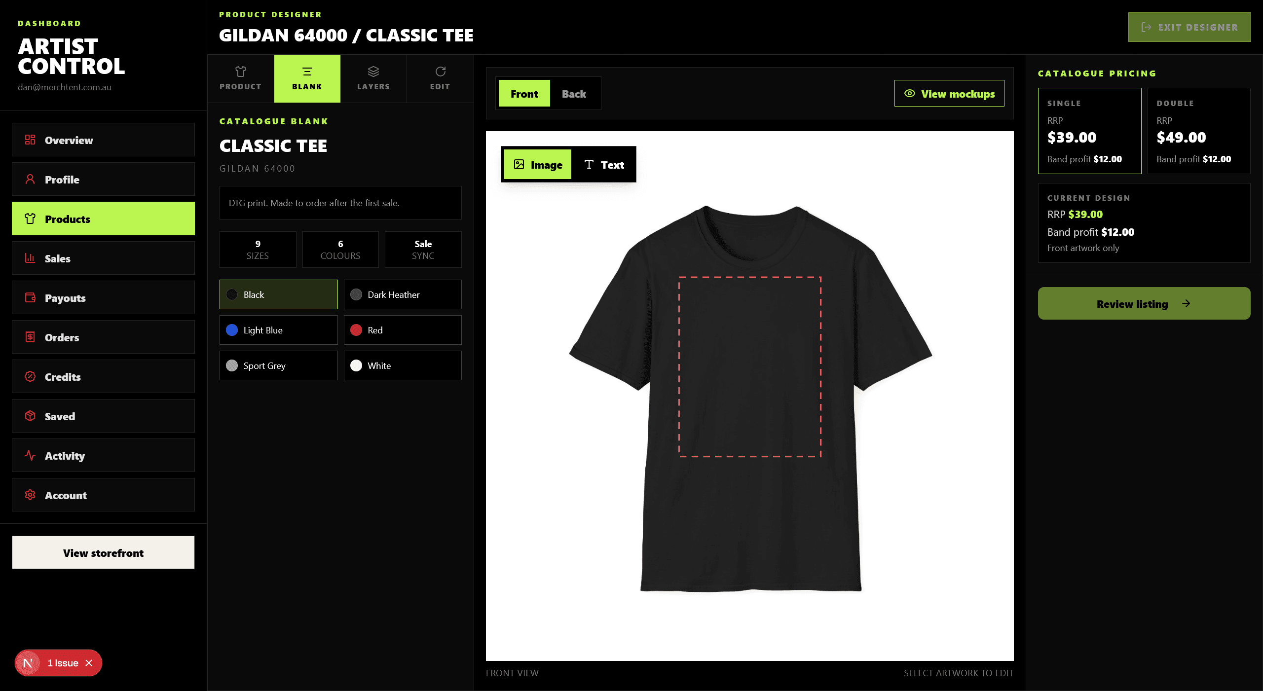 The Merch Tent product designer showing a blank black tee ready for artwork